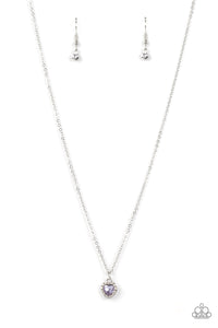 Bordered in glassy white rhinestones, a dainty purple rhinestone heart sparkles along a dainty silver chain below the collar for a flirtatious fashion. Features an adjustable clasp closure.