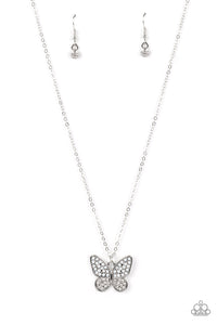 Dotted in opalescent and glassy white rhinestones, a whimsical silver butterfly flutters along a dainty silver chain below the collar for an enchanting fashion. Features an adjustable clasp closure.