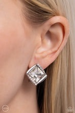 Load image into Gallery viewer, Shiny silver bars gently overlap with white rhinestone encrusted silver bars around a square cut white rhinestone, resulting in a refined radiance. Earring attaches to a standard clip-on fitting.
