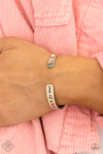 Load image into Gallery viewer, A minimalistic silver bar etched with the words, “one of a kind” on one end and embellished with a dainty rhinestone and pastel gems on the other, curves into a simple cuff around the wrist.  Sold as one individual bracelet.  New Kit Fashion Fix
