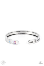 Load image into Gallery viewer, A minimalistic silver bar etched with the words, “one of a kind” on one end and embellished with a dainty rhinestone and pastel gems on the other, curves into a simple cuff around the wrist.  Sold as one individual bracelet.  New Kit Fashion Fix
