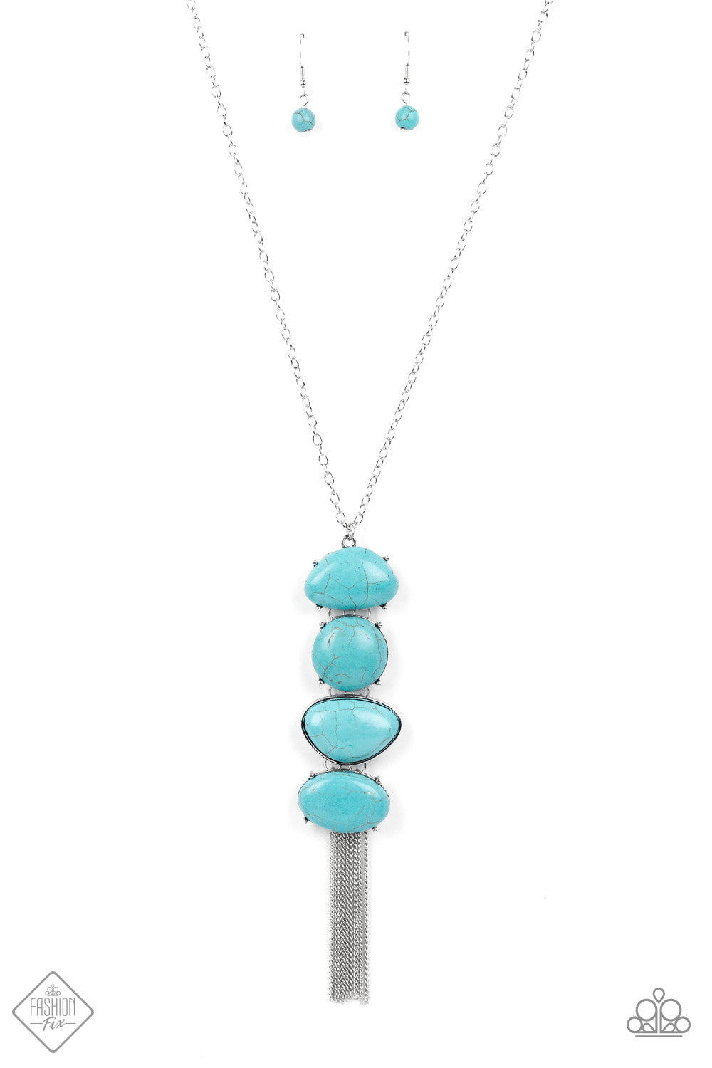 Stacked turquoise stones create an oversized pendant that sways from the bottom of a lengthened silver chain. The irregular-shaped stones add artisanal character while a flirty fringe of dainty chains adds playful energy. Features an adjustable clasp closure.  Sold as one individual necklace. Includes one pair of matching earrings.  New Kit Fashion Fix