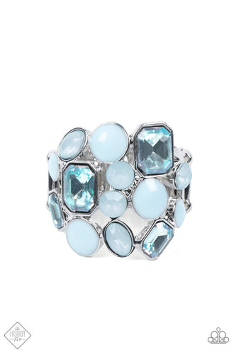 Sparkling blue gems, milky opalescent beads, and blue enamel-coated circles in varying sizes gather into an ethereal cluster atop the finger. Features a stretchy band for a flexible fit.  Sold as one individual ring.  New Kit Fashion Fix