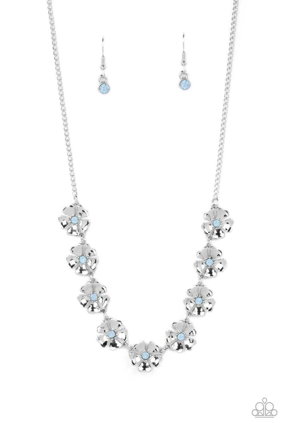 Heart-shaped silver petals bloom from opaque Spun Sugar rhinestone centers, creating colorful flowers. The dainty floral frames delicately dance below the collar, connecting into a whimsical centerpiece. Features an adjustable clasp closure.
