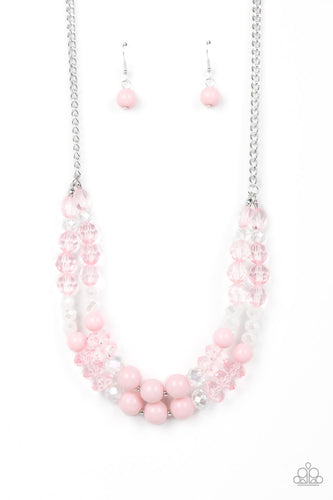 Featuring white, iridescent, and Gossamer Pink, mismatched sections of glassy, crystal-like, and acrylic beads are threaded along invisible wires below the collar. Suspended from the bottom of a shiny silver chain, the colorful layers twinkle and shimmer in the light. Features an adjustable clasp closure.