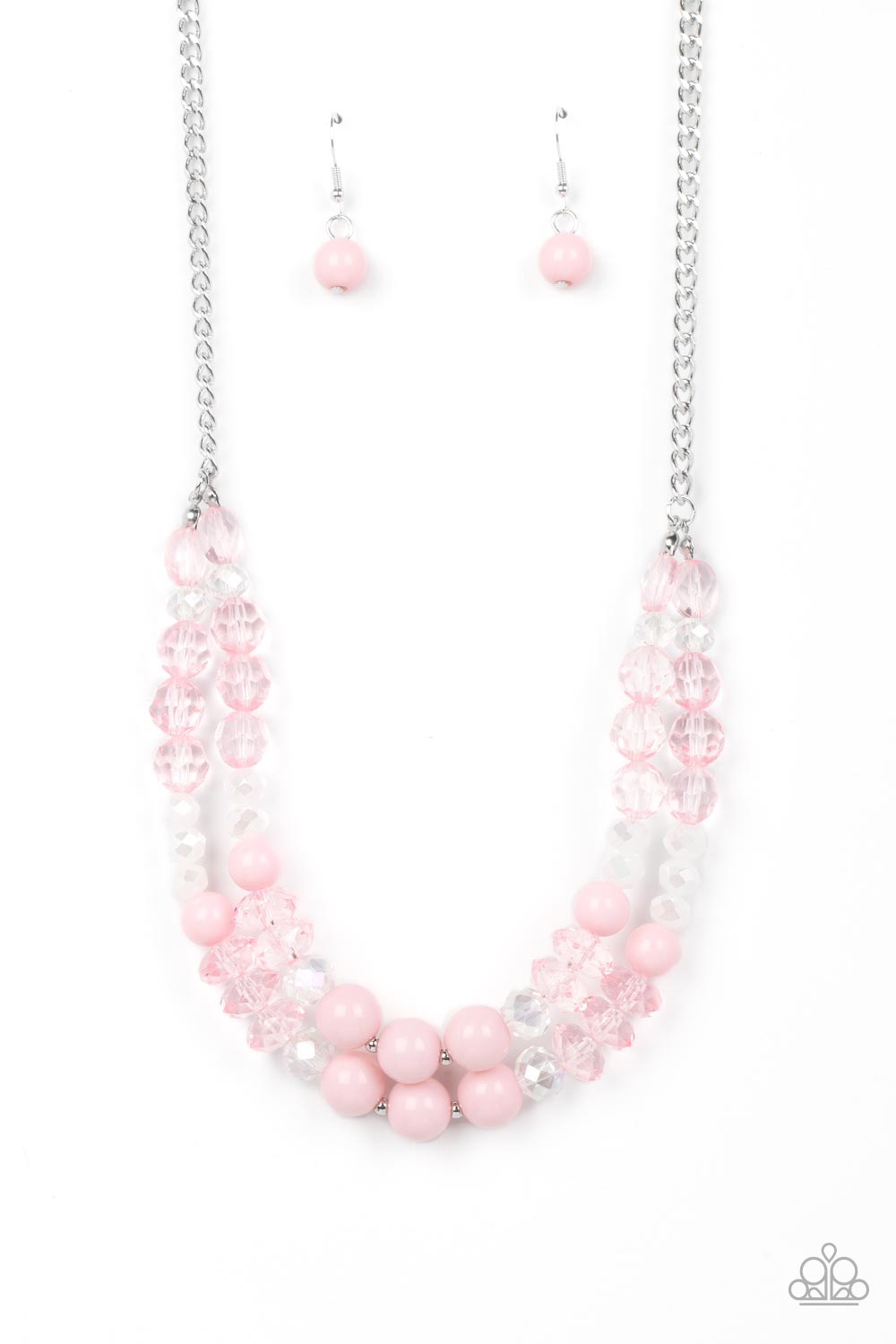 Featuring white, iridescent, and Gossamer Pink, mismatched sections of glassy, crystal-like, and acrylic beads are threaded along invisible wires below the collar. Suspended from the bottom of a shiny silver chain, the colorful layers twinkle and shimmer in the light. Features an adjustable clasp closure.
