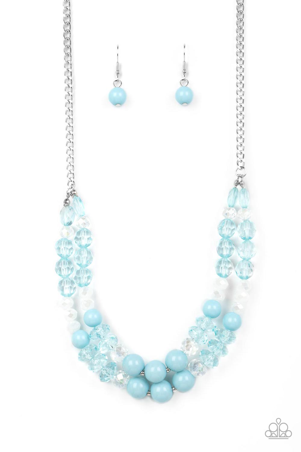 Featuring white, iridescent, and Spun Sugar, mismatched sections of glassy, crystal-like, and acrylic beads are threaded along invisible wires below the collar. Suspended from the bottom of a shiny silver chain, the colorful layers twinkle and shimmer in the light. Features an adjustable clasp closure.