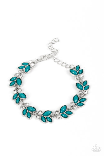 Trios of Harbor Blue beads fan out from pairs of white rhinestones as they delicately link around the wrist, resulting in colorful leafy accents. Features an adjustable clasp closure.