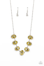 Load image into Gallery viewer, Dainty rows of glittery white rhinestones gently curve around the bottoms of oversized Daffodil oval gems. The sparkly frames delicately connect below the collar, creating a colorful centerpiece. Features an adjustable clasp closure.
