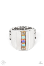 Load image into Gallery viewer, Featuring a high sheen silver, a wide band is divided down the center by a stack of five dainty square gems. The spectrum of colors from white to yellow to coral creates a prismatic arrangement atop the finger. Features a stretchy band for a flexible fit.  Sold as one individual ring.  New Kit Fashion Fix
