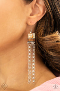 A peachy square-cut rhinestone is paired with two smaller gems in a milky iridescent finish and set above a rectangular bar of natural wood to create an art deco-inspired frame. A stream of vintage silver chains falls from the modern display, bringing playful energy to the artful design. Earring attaches to a standard fishhook fitting.  Sold as one pair of earrings.  New Kit Fashion Fix