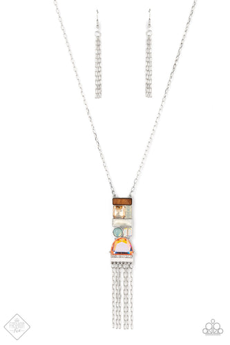 Geometric shapes in various colors and finishes gathers into a trendy art deco-inspired pendant. An array of materials like wood, opal, and glittery gems add a handcrafted vibe to the pendant as it sways from the bottom of a lengthened silver chain, with a stream of sparkling silver chains bringing a flirty finishing touch to the design. Features an adjustable clasp closure.  Sold as one individual necklace. Includes one pair of matching earrings.  New Kit Fashion Fix