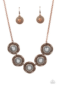 Studded copper bars asymmetrically arc around studded copper petals that bloom from stenciled silver centers. The handcrafted frames delicately link below the collar, creating a rustic statement piece. Features an adjustable clasp closure. </p><br>Featured inside The Preview at GLOW! 