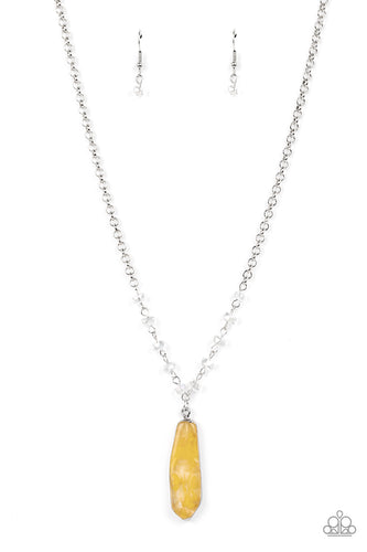 Featuring a faux stone finish, yellow smoke is encapsulated in an acrylic frame below the collar. Glittery crystal-like beads sparkle along the silver chain, drawing attention to the mystical pendant. Features an adjustable clasp closure. Due to is prismatic palette, color may vary. 