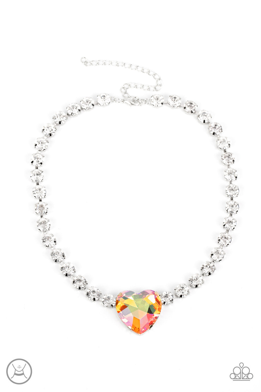 A dramatically oversized heart-shaped gem with a reflective, iridescent orange finish glitters at the center of a blinding row of glassy white rhinestones, resulting in a flirtatious sparkle around the neck. Features an adjustable clasp closure. Due to its prismatic palette, color may vary.