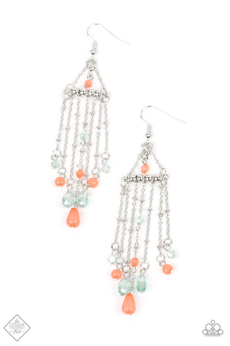 Tassels of silver chain fall from the bottom of a silver bar suspended by a pair of satellite chains. A faceted coral bead swings from the top of the frame, with additional coral beads and Basil accents adding playful pops of color to the tassels below. Earring attaches to a standard fishhook fitting.  Sold as one pair of earrings.  New Kit Fashion Fix