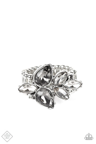 Smoky teardrop gems, accented with glassy marquise cut rhinestones, build into a fragmented cluster creating a glistening centerpiece atop the finger. Features a stretchy band for a flexible fit.  Sold as one individual ring.  New Kit Fashion Fix