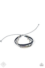 Load image into Gallery viewer, Mismatched strands of sparkly silver thread, braided navy blue leather cording, and gray string fall into seamless layers as they wrap around the wrist. A strand of dainty silver ball chain is added to the mix, as classic silver beads and oil spill crystal-like gems embellish the gray and silver strands in a stellar finish. Features an adjustable sliding knot closure.  Sold as one individual bracelet.  New Kit Fashion Fix
