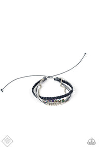 Mismatched strands of sparkly silver thread, braided navy blue leather cording, and gray string fall into seamless layers as they wrap around the wrist. A strand of dainty silver ball chain is added to the mix, as classic silver beads and oil spill crystal-like gems embellish the gray and silver strands in a stellar finish. Features an adjustable sliding knot closure.  Sold as one individual bracelet.  New Kit Fashion Fix