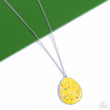 Load image into Gallery viewer, Featuring a shell-like iridescence, shimmery flecks are sprinkled along a mustard yellow backdrop inside of a glassy casing. The colorful teardrop swings from the bottom of an extended silver chain, creating a summery pendant. Features an adjustable clasp closure. &lt;/p&gt;&lt;br&gt;Featured inside The Preview at GLOW! 
