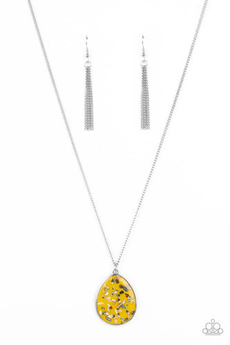 Featuring a shell-like iridescence, shimmery flecks are sprinkled along a mustard yellow backdrop inside of a glassy casing. The colorful teardrop swings from the bottom of an extended silver chain, creating a summery pendant. Features an adjustable clasp closure. </p><br>Featured inside The Preview at GLOW! 