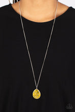 Load image into Gallery viewer, Featuring a shell-like iridescence, shimmery flecks are sprinkled along a mustard yellow backdrop inside of a glassy casing. The colorful teardrop swings from the bottom of an extended silver chain, creating a summery pendant. Features an adjustable clasp closure. &lt;/p&gt;&lt;br&gt;Featured inside The Preview at GLOW! 
