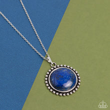 Load image into Gallery viewer, A delicate elongated silver chain leads down to a lapis stone set in the center of a decorative silver-studded frame, creating an exaggerated earthy centerpiece. Features an adjustable clasp closure. As the stone elements in this piece are natural, some color variation is normal
