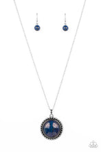 Load image into Gallery viewer, A delicate elongated silver chain leads down to a lapis stone set in the center of a decorative silver-studded frame, creating an exaggerated earthy centerpiece. Features an adjustable clasp closure. As the stone elements in this piece are natural, some color variation is normal
