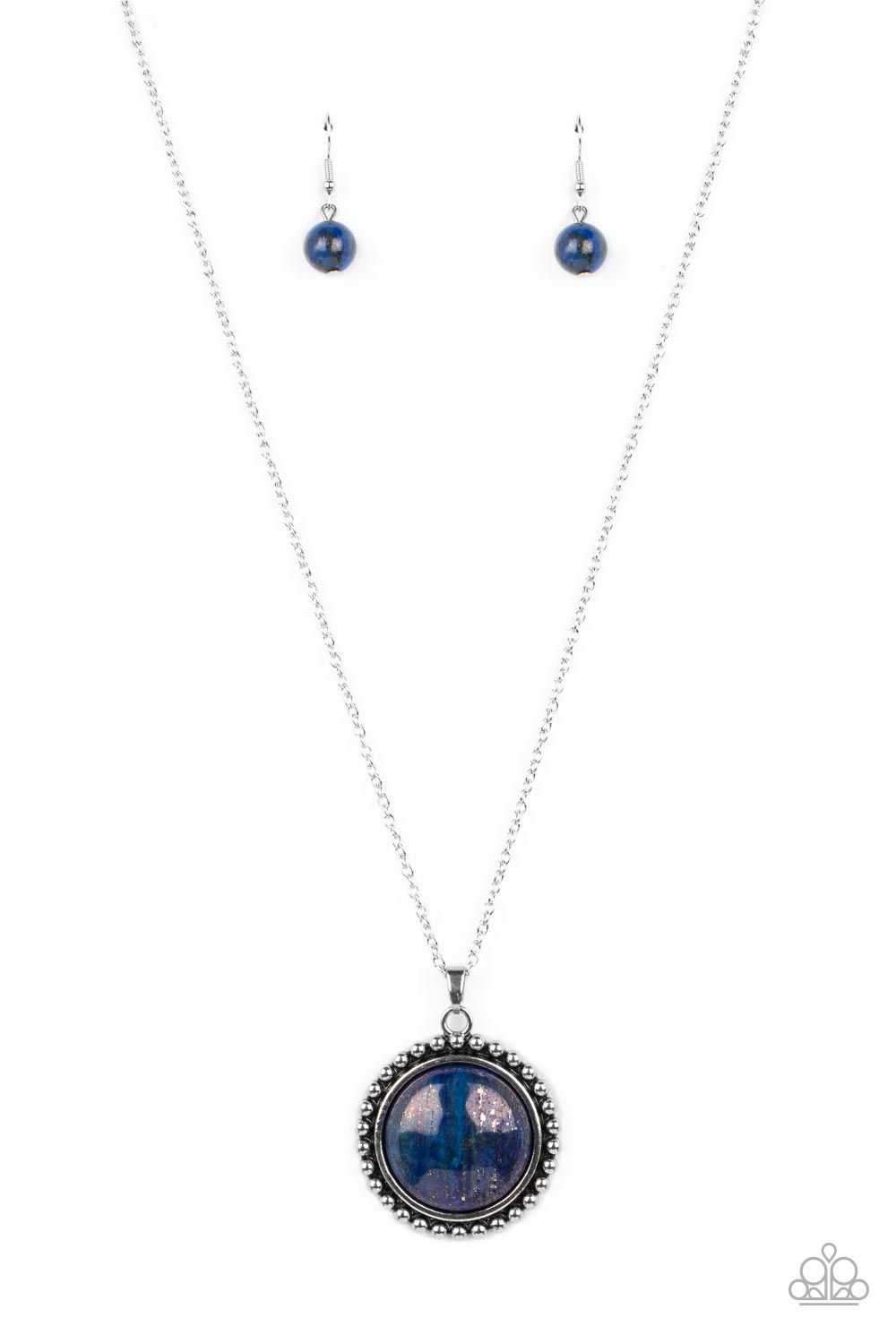 A delicate elongated silver chain leads down to a lapis stone set in the center of a decorative silver-studded frame, creating an exaggerated earthy centerpiece. Features an adjustable clasp closure. As the stone elements in this piece are natural, some color variation is normal