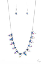 Load image into Gallery viewer, Solitaire blue rhinestones sparkle atop iridescent prism-like gems below the collar, linking into a sharp-looking statement piece. Features an adjustable clasp closure. Due to its prismatic palette, color may vary.
