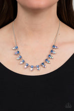 Load image into Gallery viewer, Solitaire blue rhinestones sparkle atop iridescent prism-like gems below the collar, linking into a sharp-looking statement piece. Features an adjustable clasp closure. Due to its prismatic palette, color may vary.
