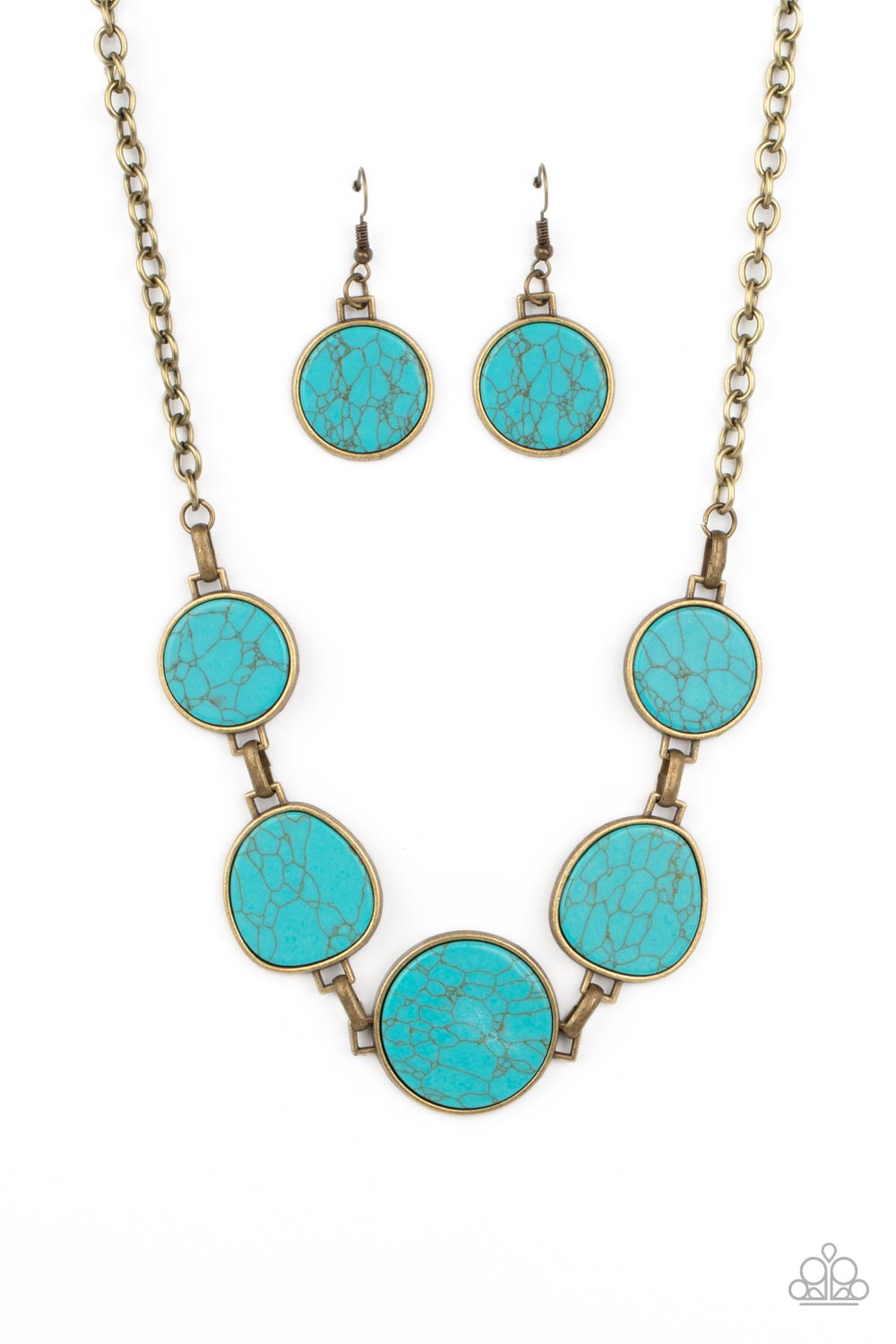 Flat turquoise stones are pressed into brass frames, creating a bold, rustic statement piece. The irregular shape of the stones brings an artisanal touch to the design, as the hinge-like links connect the colorful stones along the collar. Features an adjustable clasp closure. As the stone elements in this piece are natural, some color variation is normal. 