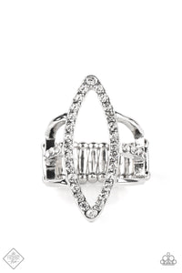 An exaggerated marquise-shaped frame dotted with rhinestones connects to three bands of silver that wrap around the finger. The center band is lined with more rhinestones, adding noteworthy sparkle to the airy design. Features a stretchy band for a flexible fit.  Sold as one individual ring.  New Kit Fashion Fix