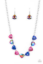 Load image into Gallery viewer, A collection of dreamy trilliant-cut rhinestones in iridescent shades of blue and pink fall in line along the collar in a majestic finish. Features an adjustable clasp closure. Due to its prismatic palette, color may vary.
