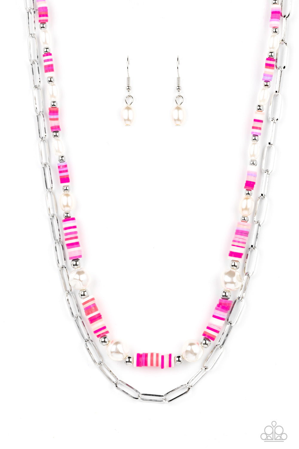 Sections of colorful rubber discs in shades of pink, purple, and white are separated by tiny silver beads and a variety of white baroque pearls to create an unexpected mashup of texture along the collar. A strand of silver paperclip link chain is paired with the abstract design in a layered finish. Features an adjustable clasp closure.