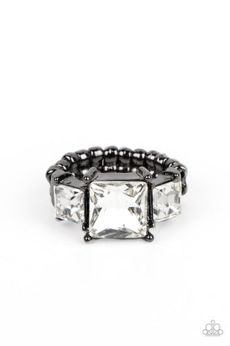 Featuring regal princess cuts, three brilliant white rhinestones sparkle inside pronged gunmetal fittings atop the finger in a dramatic finish. Features a dainty stretchy band for a flexible fit. 