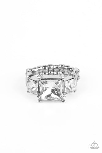 Featuring regal princess cuts, three brilliant white rhinestones sparkle inside pronged silver fittings atop the finger in a dramatic finish. Features a dainty stretchy band for a flexible fit. 