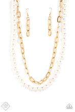 Load image into Gallery viewer, A string of classic white pearls is layered with a strand of oversized gold links, creating a gorgeous collision of refinement and grit as they lay along the collar. Features an adjustable clasp closure.  Sold as one individual necklace. Includes one pair of matching earrings.
