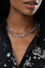 Load image into Gallery viewer, Set in dainty silver heart-shaped frames, staggered clusters of glassy sapphire rhinestones delicately link into a flirtatious hint of sparkle below the collar. Features an adjustable clasp closure. Due to its prismatic palette, color may vary. 
