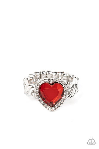 A faceted red heart gem is pressed into a silver heart frame studded with dainty white crystals for a romantic centerpiece atop the finger. Textured twists dotted with similar dainty crystals climb up the sides of the ring for additional sparkle. Features a dainty stretchy band for a flexible fit.