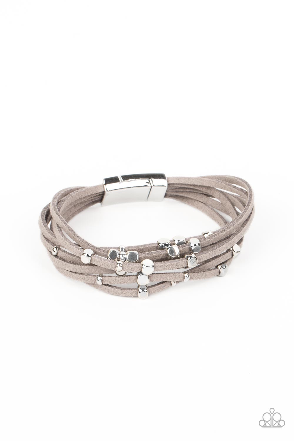 Row after row of gray suede cords layer around the wrist. Varying sizes of shiny silver studs coalesce across the cords in an out-of-this-world pattern for a starry statement. Features a magnetic closure.  Sold as one individual bracelet