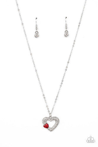A luxurious airy silver heart lush with glassy white rhinestones swings from a classic silver chain. A faceted heart gem brushed in a red shimmer graces one side of the larger bedazzled heart for a romantic finish. Features an adjustable clasp closure. 