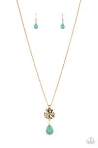 Swinging from a dainty gold chain, a hammered disc in the same hue is stamped with the words "be kind." A chiseled turquoise teardrop hangs from the bottom of the pendant adding a fashionably rustic feature. Features an adjustable clasp closure. As the stone elements in this piece are natural, some color variation is normal.