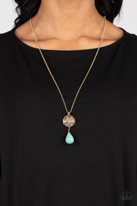 Swinging from a dainty gold chain, a hammered disc in the same hue is stamped with the words "be kind." A chiseled turquoise teardrop hangs from the bottom of the pendant adding a fashionably rustic feature. Features an adjustable clasp closure. As the stone elements in this piece are natural, some color variation is normal.