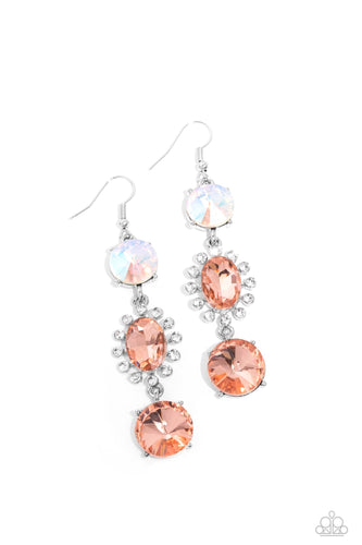 A trio of colorfully iridescent and brilliantly sparkling peach gems are linked together as they fall glamorously from the ear. A round-cut gem with an exaggerated faceted surface anchors the cascade, followed by an oval-cut peach rhinestone bordered in classic white rhinestones.