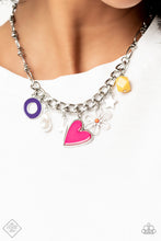 Load image into Gallery viewer, Elongated silver chain links, separated by tiny silver beads, lead down the neckline to a section of thick, flat, silver curb chain. A collection of whimsical charms gather along the thicker chain, including a lightning bolt, a star, a purple ring, a silhouette of a flower, a vibrant yellow bead, a pink heart, and a polished white baroque pearl. Features an adjustable clasp closure.  Sold as one individual necklace. Includes one pair of matching earrings.
