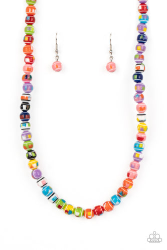 Stretched across an invisible wire, multicolored beads, featuring various multicolored splatters across the surface, coalesce around the collar. Reminiscent of gobstopper candy, the sweet display of colors creates a cheerfully vivacious display. Features an adjustable clasp closure.  Sold as one individual necklace. Includes one pair of matching earrings.