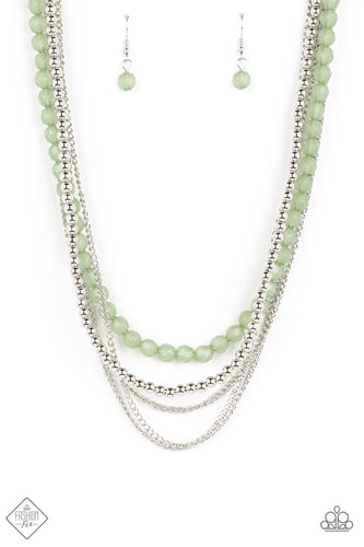 Shiny silver beads fall together with classic silver chains to create shimmery layers along the collar. A strand of opaque, faceted beads, in the calming shade of Loden Frost, emerges from the backdrop of metallic sheen, adding a subtle pop of color to the invigorating design. Features an adjustable clasp closure.  Sold as one individual necklace. Includes one pair of matching earrings.