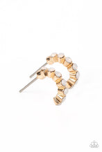 Load image into Gallery viewer, Tiny, white, opalescent beads are encased in gold fittings, falling in line as they curve into a dainty hoop. The gold frames create a scalloped pattern along the sides of the hoop, while the opalescent beading radiates shimmer from the front. Earring attaches to a standard post fitting. Hoop measures approximately 1/4&quot; in diameter.

