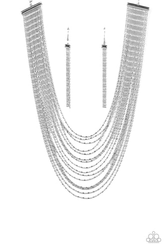 Suspended from two silver, horizontal bars, a shimmery cascade of high-sheen silver ball-and-bar chains layer around the neck for an industrial statement. Features an adjustable clasp closure. 